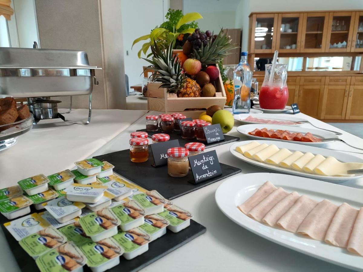 Pedrogao Guesthouse Exterior photo A typical breakfast buffet